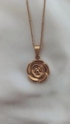 Gold plated rose flower necklace Stainless steel (non tarnish) Classic chain 45cm (18") Pendant size 31mm x 20mm Rose Gold Stainless Steel Clavicle Chain Charm Necklace, Rose Gold Necklace With Flower Pendant And Roses, Rose Gold Necklace With Flower Pendant, Rose Gold Stainless Steel Clavicle Charm Necklace, Rose Gold Flower Pendant Necklace With Roses, Rose Gold Stainless Steel Clavicle Chain Necklace, Rose Gold Charm Necklace With Flower Pendant, Rose Gold Stainless Steel Chain Necklace, Tarnish Resistant, Rose Gold Stainless Steel Chain Necklace Tarnish Resistant