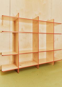 a wooden shelf with three shelves on each side