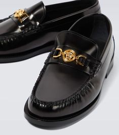 Find VERSACE Medusa '95 Leather Loafers on Editorialist. Upper: leather. Lining: leather. Sole: leather insole and sole. Toe shape: round toe. Made in Italy. Includes: shoe box, dust bags. Designer color name: Black-Versace Gold. Versace Gold, Leather Loafers, Color Names, Shoe Box, Versace, Bags Designer, Color Design, Top Brands, Dust Bag