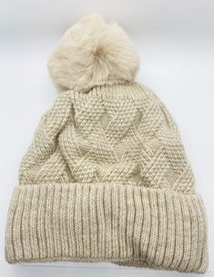 Fits both teenage girls and adult ladies. With their stretchy construction, the fleece lined hat is one-size-fits-most. Material: 70% Acrylic, 30% Wool Full Fleece Lining inside which will keep you warm and cozy. The pom pom is made of faux fur and has the soft touch. It's suitable for everyday wear and will be the perfect gifts . Knitted Winter Bonnet Cap, Beige Soft Knit Crochet Hat For Winter, Cream Soft Knit Beanie Bonnet, Cream Bonnet Beanie For Fall, Warm Brimmed Bonnet For Cold Weather, Beige Warm Bonnet One Size, Cream Beanie Bonnet For Winter, Cream Beanie Bonnet For Fall, Warm Beige Bonnet One Size