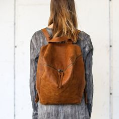 This stunning backpack is made of genuine soft nappa leather in a Honey Brown color. With enough room for all your daily essentials, It is perfect for everyday use, as well as for laptops of most sizes,  IPAD, A4 files, books and travel. It offers a spacious, lined interior with two large compartments, a zipper pocket, and adjustable straps. The antique gold hardware adds a touch of elegance and modernity to the overall look. Features: *  1 Interior large zipped pocket * Outside zipper pocket in Leather Backpack Women, School Satchel, Women Backpack Travel, Leather Laptop Backpack, Brown Leather Backpack, Backpack Laptop, Leather Backpack Purse, Leather Rucksack, Women Leather Backpack