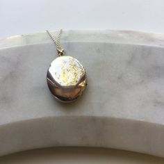 This beautiful vintage locket has an engraved scroll pattern on the front and a plain back. It comes on a modern sterling silver 18" chain or with no chain, please select which from the dropdown box.Hallmarked with the makers mark 'ZJ' and Sterling Silver 925 on the bail.Locket measurements: 3.2cm height, 2.5cm width, 0.7cm depth.The necklace will come beautifully presented in a Lime Tree Design box.IMPORTANT INFORMATION REGARDING SHIPPING:Orders to UK addresses are sent using Royal Mail  which Oval Locket Necklace, Locket Necklace Vintage, Silver Locket Necklace, Vintage Locket, Lime Tree, Design Box, Oval Locket, Silver Paper, Silver Locket