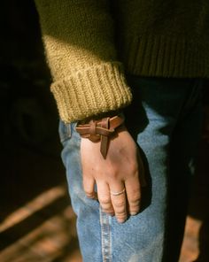 The Leather Knot bracelet is simple but elegant and fits right in at any occasion. Both the dark brown and natural versions age subtly and over time develop a beautiful patina unique to each person. It's no surprise this is our best-selling piece. "I appreciate the usefulness and beauty of knots and braiding incorporated in horse tack, especially the intricacy of Argentine gaucho saddlery. The knot bracelet is a simple, yet intriguing way to wear a piece of the west everyday." -Madi Phillips, Le Adjustable Brown Wristband For Everyday Use, Adjustable Waxed Finish Bracelets For Everyday, Brown Leather Strap Bracelet, Everyday Leather Bracelet With Waxed Finish, Adjustable Brown Bracelet, Adjustable Brown Bracelets For Everyday Use, Rustic Leather Strap Jewelry Gift, Brown Adjustable Band Bracelet Jewelry, Rustic Jewelry With Leather Strap For Gift