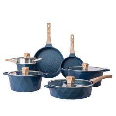 blue pots and pans with wooden handles