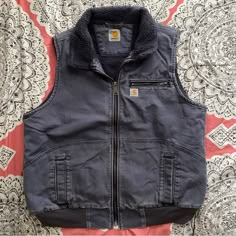 Carhartt Weathered Duck Wildwood Vest. Hood Not Included. Euc. Hardly Worn. 12 Ounce 100% Weathered Duck. Sherpa Lined. Full Zip Front. Rib Knit Waistband. Two Lower Front Pockets. One Zippered Chest Pocket. One Interior Pocket. Second Hidden Interior Pocket. Triple-Stitched Main Seams. C513 Firm Price Cathartic Vest, Carhartt Vest, Carhartt Jackets, Carhartt Womens, Carhartt Women, Hooded Vest, Winter Fits, Sherpa Lined, Blue Stone