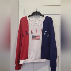 Nwot Red White And Blue Sweatshirt With America And American Flag Graphic On Front Only Super Soft Size Xl Shoulder To Hem 24.5" Armpit To Armpit 25" Drop Sleeve 22.5" Cotton/Poly Blend Casual American Flag Print Tops For Fall, Patriotic Flag Print Tops For Fall, Casual Flag Print Tops For Fall, Casual Fall Tops With Flag Print, Casual Tops With Flag Print For Fall, Red Patriotic Top For Fall, American Flag Print Long Sleeve Top For Fall, Long Sleeve Tops With American Flag Print For Fall, Casual Long Sleeve Sweater For 4th Of July