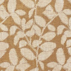 a brown and white fabric with leaves on it