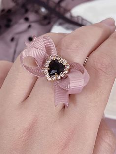 The price is for a ring only, others are not included. Pink Ribbon Wedding Jewelry, Elegant Pink Crystal Ring For Party, Elegant Adjustable Jewelry With Pink Bow, Elegant Heart-shaped Rings For Party, Elegant Heart Shaped Rings For Parties, Wedding Jewelry With Pink Bow, Black Bow Jewelry Gift, Black Bow Jewelry For Gifts, Black Bow Jewelry For Gift