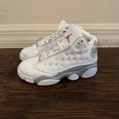 Air Jordan 13 Retro Wolf Grey Kids Shoes Size 11c Dj3005-160 White High-top Jordan Shoes With Rubber Sole, White Synthetic Jordan Shoes With Rubber Sole, White Basketball Shoes With Rubber Sole, White Mid-top Jordan Shoes With Laces, Gray Jordan Shoes With Round Toe, White Synthetic Jordan Shoes With Boost Midsole, White Lace-up Jordan Shoes, White Jordan Shoes With Branded Insole, White High-top Jordan Shoes