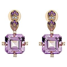 Presented A lovely collection of gems, including Swiss Blue Topaz, Amethyst, and Citrine, is perfect for people who value quality and want to wear it to any occasion or celebration. Pink tourmaline and tanzanite embellishments on Top side add to the earring's artistic and beautiful design. One of them is a simple yet stunning Rose gold Swiss blue topaz Earring. Amethyst Drop Earring in 18Karat Rose Gold with Tanzanite, Pink Tourmaline, and White Diamond. Amethyst: 16.44 carat, 12X12mm size, octagon shape. Tanzanite: 0.05 carat, 1.50mm size, round shape. Pink Tourmaline: 0.09 carat, 1.50mm size, round shape. Pink Tourmaline: 0.49 carat, 1.50mm size, round shape. Amethyst: 0.19 carat, 1.50mm size, round shape. Diamond: 0.10 carat, 1.50mm size, round shape, G color, VS clarity. Gold: 8.44, 18 Amethyst And Citrine, Butterfly Pin, Blue Topaz Earrings, Naha, Topaz Earrings, Swiss Blue Topaz, Amethyst Earrings, Drop Earring, Gems Jewelry