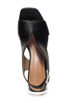 Curvy cutouts and a deep vamp distinguish this leather slingback pump set on a cushioned footbed and lofty block heel. 2" heel Cushioned footbed Leather upper, lining and sole Made in Brazil Leather Slingback Sandals With Deep Heel Cup For Evening, Medium Width Leather Slingback Heels, Modern Leather Slingback Pumps With 4-inch Heel, Leather High Heel Slingback Pumps With Reinforced Heel, Modern Leather Slingback Sandals With Deep Heel Cup, Leather Slingback Sandals With Deep Heel Cup For Party, Formal Leather Slingback Sandals With Block Heel, Leather Slingback Pumps With Wedge Heel, Black Leather Slingback Pumps With Deep Heel Cup