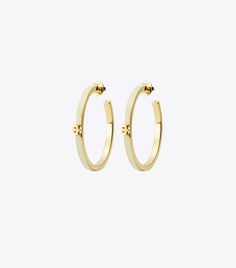 Kira Enamel Hoop Earring: Women's Designer Earrings | Tory Burch Modern Hoop Earrings With Gold-tone Hardware, Small Hoop Earrings With Gold-tone Hardware For Everyday, Gold-tone Hardware Small Hoop Earrings, Everyday Hoop Earrings With Gold-tone Hardware, Gold-tone Small Hoop Earrings, Luxury Small Hoop Earrings For Everyday, Luxury Everyday Small Hoop Earrings, Polished Finish Hoop Earrings, Luxury Gold-tone Hoop Earrings