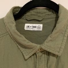 -Brand Nwot -Size Xxl -Soft Feeling Shirt In An Darker Army Green Color. Has A Neat Pen Holder On Left Pocket As Seen In Pics -Pit To Pit Measure 24 1/2” -30 Inches In Length -Great Price! Reasonable Offers Accepted! Green Cotton Tops With Casual Collar, Green Cotton Top With Casual Collar, Khaki Cotton Top With Casual Collar, Khaki Button Closure Top For Streetwear, Khaki Top With Button Closure For Streetwear, Green Button-up Shirt For Streetwear, Army Green Color, Soft Feeling, Pen Holder