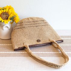 IN STOCK NOW SHIPPING FROM LOS ANGELES Elevate your style with the Elena Handbags Natural Cotton Flax Basket Shoulder Bag. Crafted from durable natural cotton flax, this bag offers both fashion and function. With its basket design, it's not only trendy but also sturdy enough to carry all your essentials. Upgrade your handbag game with Elena Handbags! Made with natural cotton jute mixed yarn Magnetic button closure Fully lined with inner pocket Size: 10"H x 15"W x 7"D Drop length 12 inches Design Eco-friendly Neutral Crochet Tote Bag, Eco-friendly Cream Jute Shoulder Bag, Everyday Neutral Jute Bags, Beige Woven Cotton Straw Bag, Casual Cotton Straw Bag For Travel, Casual Jute Bags In Neutral Color, Handmade Beige Burlap Bag, Natural Cotton Beach Bag For Daily Use, Casual Neutral Jute Bags