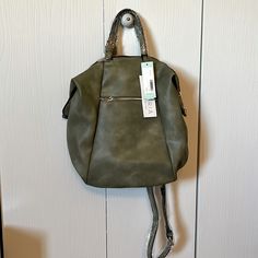 Vegan Sage Green Convertible Backpack Green Backpack Shoulder Bag For Errands, Green Backpack For Errands, Green Casual Crossbody Backpack, Casual Green Crossbody Backpack, Green Backpack With Detachable Strap For Travel, Trendy Green Backpack For Everyday Use, Casual Backpack With Detachable Strap And Double Handle, Satchel Backpack With Zipper Closure For Errands, Backpack Satchel With Zipper Closure For Errands