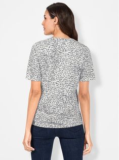 A favorite for everyday wear! Harmonious yet eye-catching patterned top in a soft fabric. Chic rounded neckline with trim and decorative pleat. Length approx. 26 in. 100% cotton. Machine washable. Imported. Patterned Short Sleeve Tops For Fall, Printed Viscose V-neck Top, Fall Short Sleeve Tops With All Over Print, Cotton V-neck Top With All Over Print, Casual Crew Neck Top In Viscose, Casual Viscose Crew Neck Top, Casual Short Sleeve Tops In Viscose, Fitted Floral Print Viscose Top, Casual Short Sleeve Viscose Tops