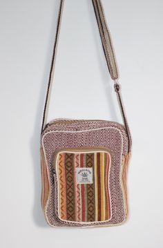 This Hemp Minimal Side bag have been beautifully handcrafted with cotton lining inside and is very sturdy. Carry all your essentials for your short trips either to a shopping mall or to your local grocery store. It's so light you can carry it all day without feeling it's even there. Material: 70% Cotton and 30% Hemp Size: 9 x 7 x 2 in Casual Satchel As Gift, Rectangular Canvas Travel Bag With Cell Phone Pocket, Rectangular Travel Canvas Bag With Cell Phone Pocket, Beige Rectangular Cotton Satchel, Eco-friendly Canvas Bag With Adjustable Strap For Daily Use, Everyday Cotton Shoulder Bag With Cell Phone Pocket, Rectangular Canvas Bag With Cell Phone Pocket, Cotton Shoulder Bag With Cell Phone Pocket, Eco-friendly Canvas Bag With Adjustable Strap For Everyday Use