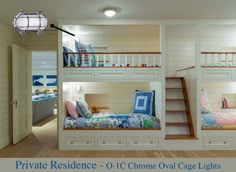 two bunk beds are in the middle of a room with wooden floors and white walls