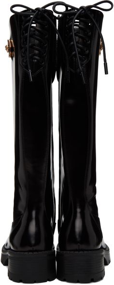 Knee-high patent calfskin boots in black. · Zip closure at inner side · Signature Medusa hardware at outer side · Lace-up detailing at heel collar · Buffed lambskin lining · Treaded rubber sole · Heel: H1.75 in Supplier color: Black Sleek Glossy Boots For Evening, Elegant Glossy Evening Boots, Sleek Glossy Finish Evening Boots, Luxury Patent Leather High Heel Knee-high Boots, Luxury High Heel Patent Leather Knee-high Boots, Luxury High Heel Knee-high Boots In Patent Leather, Luxury Patent Leather Knee-high Boots With Pointed Toe, Evening Patent Leather Knee-high Heeled Boots, Evening Knee-high Patent Leather Heeled Boots