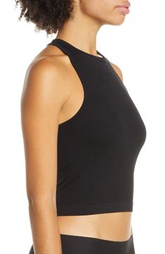 Lounge or layer in this oh-so-versatile ribbed crop top that looks (and feels) great wherever you go. 17" length (size Medium/Large) Crewneck Sleeveless Racerback 92% nylon, 8% spandex Machine wash, dry flat Imported Stretch Seamless Crop Top For Layering, Versatile Seamless Crop Top For Layering, Seamless Crop Top Tank For Layering, Black Seamless Cropped Crop Top, Stretch Athleisure Crop Top For Night Out, Spring Cropped Tops With Medium Support, Cropped Tops With Medium Support For Spring, Medium Support Cropped Crop Top With Built-in Bra, Athleisure Stretch Crop Top For Layering