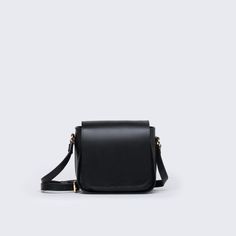 Strap drop adjusts from 15,4 in (39 cm). to 19.3 in (49 cm) Magnetic snap closure 1 interior zipper pocket Leather Trim Crossbody Shoulder Bag For Work, Crossbody Shoulder Bag With Leather Trim For Work, Classic Black Camera Bag For Business, Classic Crossbody Satchel With Leather Trim, Classic Leather Trim Crossbody Satchel, Everyday Black Saddle Bag, Modern Black Leather Saddle Bag, Classic Satchel Camera Bag With Adjustable Strap, Black Leather Shoulder Bag With Adjustable Handle