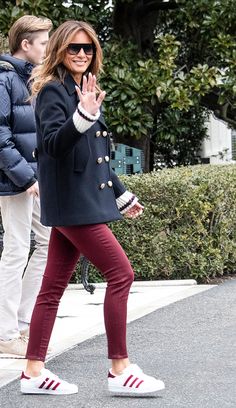 Melania Trump wearing Adidas Superstar sneakers leaving the White House in March 2019. #flotus #melaniatrump #adidasshoes Outfit Pantalon Vino, Slouch Boots, Military Style Jackets, Weekend Getaway, Military Fashion, Classy Outfits, Chic Outfits, Work Outfit