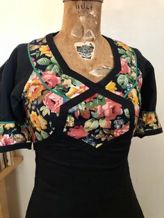 1970s cotton dream dress. Short flutter sleeves that are completely open on the underside with matching handkerchief hem. Attached waist sash and side zip. This piece has absolutely no stretch and is best for an xxs-xs. Found in the Netherlands by the original owner. MEASUREMENTS(taken flat, double when appropriate) PTP 16 1/2waist 13hips 18length 49 1/2 Vintage Cotton V-neck Dress, Retro Fitted Square Neck Dress, Spring Vintage Cotton Fitted Dress, Spring Vintage Fitted Cotton Dress, Fitted Cotton Vintage Dress For Spring, Vintage Floral Print Cotton Dress With Short Sleeves, Fitted Vintage Cotton Dress With Floral Print, Vintage Dress With Fitted Bodice And Short Sleeves, Fitted Short Sleeve Vintage Summer Dress