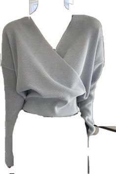 Chic Knit V-neck Blouse, Cozy Fine Knit V-neck Tops, Cozy V-neck Fine Knit Tops, Chic Knit V-neck Sweater For Winter, Trendy V-neck Cropped Sweater For Winter, Gray V-neck Blouse For Fall, Chic Long Sleeve Knitted Sweater, Chic Knitted V-neck Sweater For Winter, Oversized V-neck Top For Winter