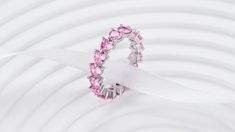 The name says it all, eternity is forever and this light pink heart stone eternity band is a perfect symbol for endless love! Gift this to a loved on this Valentines Day. This ring is a LIMITED EDITION Valentines special. So don't miss out because it wont be restocked once sold out! The Endless Love Ring has PREMIUM pink heart cut stones all around. It can be worn alone or stacked up with other rings to make a powerful impression. Enjoy the luxurious and Timeless design. Material: Full Sterling Pink Eternity Band For Promise Ring, Pink Crystal Ring For Valentine's Day Wedding, Pink Crystal Ring For Wedding On Valentine's Day, Pink Crystal Ring For Wedding And Valentine's Day, Pink Eternity Band Ring As Gift, Pink Round Eternity Band For Promise Ring, Elegant Pink Eternity Band For Promise Ring, Pink Cubic Zirconia Eternity Band For Anniversary, Pink Stackable Eternity Band As Gift