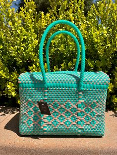 🌵Unique handwoven eco-friendly bag made with repurposed plastic. Perfect multi-use bag for any occasion.Handcrafted with great care by Mexican Artisans. 🌵Small Tote Approx. Dimensions  Length 12" | Height: 8" | Width 6" | Handle:10"  Magnetic closure  Easy Clean Wipe Down  Washable and Air Dry  Resistant  *All woven products may vary slightly in size and pattern due to the nature of being handmade* ️If you have any questions, please feel free to contact us. We are happy to help 😊 Green Rectangular Straw Bag For Market, Green Recycled Materials Bag For Daily Use, Eco-friendly Blue Bag Made Of Recycled Materials, Eco-friendly Blue Bag From Recycled Materials, Eco-friendly Blue Bags Made From Recycled Materials, Eco-friendly Square Beach Bag, Eco-friendly Rectangular Beach Bag, Reusable Tote Bag Made Of Recycled Materials, Eco-friendly Summer Bag From Recycled Plastic Bottles