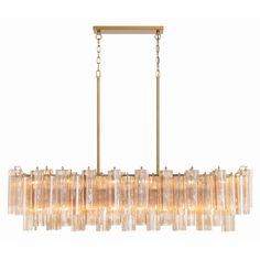 a large chandelier with many glass tubes hanging from it's brass frame