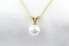 Simple and Elegant Shell pearl Necklace, dipped in Hamilton Gold plating and won't tarnish easily. Great quality, suitable for gifts and are long lasting. White Birthstone Necklace For Formal Occasions, Formal White Birthstone Necklace, Classic White Birthstone Necklaces, Elegant White Birthstone Necklaces, White Birthstone Necklace With Round Cut, White Round Cut Birthstone Necklace, White Pendant Necklace With Bail, Classic White Round Pendant Jewelry, Pearl Charm Round Necklace For Anniversary