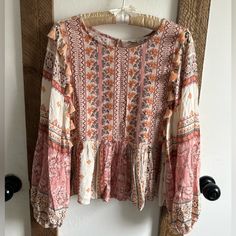 New American Eagle Blouse Bell Sleeve Boho Mixed Media Peasant Size Small Tassels Pastel Pink Gorgeous. Thought It Was From Anthropologie. Excellent Quality & Detail New Without Tags 22” Long 17” Pit To Pit Inventory Bin B Bohemian Spring Tops With Tassel Ties, Bohemian Tops With Tassel Ties For Spring, Fall Festival Bohemian Peasant Top, Bohemian Peasant Top With Boho Print, Long Sleeve Fringe Tops For Festivals, Bohemian Long Sleeve Blouse With Back Tassel Tie-up, Flowy Boho Print Peasant Top In Hippie Style, Bohemian Fall Top With Tassels, Bohemian Fall Tops With Tassel Ties