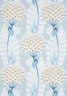 a blue and white wallpaper with some flowers on it's back side,