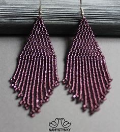 These purple beaded earrings are made of high-quality Czech beads and strong synthetic thread. They are elegant, fashionable, and highly versatile, suitable for everyday wear. Features: Sterling silver components Color: purple. This item is currently in stock. You must be completely satisfied. If you find merchandise unsatisfactory for any reason, return it within 10 days and your money will be refunded without questions. These earrings in gold color https://www.etsy.com/listing/660046267/gold-b Evening Earrings With Dangling Round Beads, Elegant Purple Beaded Earrings With Faceted Beads, Elegant Beaded Chandelier Earrings For Celebrations, Beaded Teardrop Chandelier Earrings For Party, Elegant Purple Beaded Earrings With Colorful Beads, Elegant Beaded Chain Dangle Earrings, Handmade Elegant Long Drop Beaded Earrings, Elegant Long Drop Beaded Tassel Earrings, Elegant Beaded Earrings For Celebration