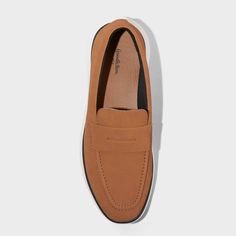 Get dressed for a day in the office and a night out with these Kobi Hybrid Loafer Sneakers from Goodfellow & Co™. These hybrid loafer sneakers showcase a cognac-color polyurethane upper and white TPR outsole. Featuring a pull-on design for easy on and off, these medium-width sneakers include a cushioned footbed and memory foam insole for extra comfortable wear. Goodfellow & Co™: Feel good in what you wear, anywhere. Casual Wingtip Slip-ons With Brogue Detailing, Casual Brown Slip-ons With Brogue Detailing, Casual Wingtip Slip-ons For Business, Casual Wingtip Slip-ons With Leather Footbed, Slip-on Oxfords With Ortholite Insole For Work, Modern Brown Slip-ons For Business Casual, Casual Brown Slip-on Oxfords, Modern Brown Loafers With Brogue Detailing, Classic Brown Low-top Slip-ons