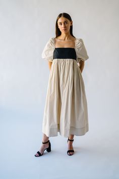 Get ready to slay in the Ambreen Puff Sleeve Maxi Dress! This unique dress features trendy puff sleeves and a flattering maxi length. The beige color adds a touch of sophistication, making it perfect for any special occasion. Stand out in style with this playful and chic dress! Details self: 100% cotton lining: 100% polyester Fabric Care Guide Here Sizing & Fit Measurements are approximate and taken while laying flat across the front. Not doubled. x-small: bust = 15"; length = 45" small: bust = Puff Sleeve Maxi Dress, Winter Maternity, Velvet Midi Dress, Unique Dress, Drop Shoulder Sweaters, Satin Midi Dress, Sleeve Maxi Dress, Maxi Dress With Sleeves, Unique Dresses