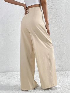 Wide Leg Pleated Solid Color Trousers with a Relaxed Fit Solid Color Straight Dress Pants For Summer, Summer Solid Color Straight Dress Pants, Summer Straight Dress Pants Solid Color, Summer Straight Dress Pants In Solid Color, Solid Summer Work Trousers, Non-stretch Straight Leg Pants, Spring Solid Beige Wide Leg Pants, Chic Solid Work Pants For Spring, Spring Beige Wide Leg Pants