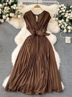 Material: PolyesterMaterial: AcetateSilhouette: A-LineSeason: SummerNeckline: V-NeckSleeve Length(cm): SleevelessDecoration: SashesStyle: Office LadyWaistline: empirePattern Type: SolidDresses Length: Mid-Calf Elegant A-line V-neck Dress For Beach, Elegant A-line V-neck Beach Dress, Elegant Sleeveless V-neck Dress For Beach, Elegant Chiffon Sleeveless Dress For The Beach, Elegant Brown V-neck Dress For Spring, Chic Brown V-neck Dress For Spring, Chic Pleated Sleeveless Dress For Beach, Beige Chiffon V-neck Dress, Beige V-neck Chiffon Dress