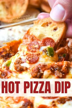 a hand holding a slice of pizza with the words hot pizza dip on it and overlay