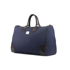 This is the bag you need for your quick weekend getaway. Durable, stylish, and the perfect size for a quick trip. THE DETAILS: Materials: Quilted dark blue fabric + Black Box Calf Italian Leather Lining: Beige fabric Dimensions: 18.89 x 13.38 × 9.84 inches / 48 x 34 × 25 cm (width x height × depth) Laser Engraving: Available by request to add up to two short lines of name or wording engraved on an exterior leather patch for an additional charge. THE FINE PRINT: Production timeline/shipping can v Elegant Tote Duffle Bag For Weekend Trips, Elegant Weekend Tote Duffle Bag, Elegant Tote Weekender Bag, Elegant Tote Weekender Bag For Weekend Trips, Elegant Weekender Tote Bag For Weekend Trips, Designer Navy Bags For Daily Use, Luxury Large Capacity Blue Satchel, Designer Blue Satchel For Travel, Elegant Rectangular Bags For Weekend Trips