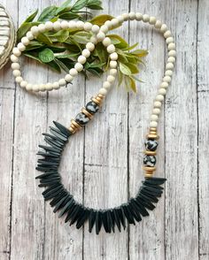 Black statement necklace. Black beaded stick Necklace. Black Necklace. Recycled glass beads.  A black and white statement necklace for all seasons!  Measures 32 inches, tied with no clasp. Message me if you would like a different length! Thank you for visiting BeadedBlues! Black And White Beaded Necklace, Profile Unique, Wood Beads Jewelry, Black And White Necklace, Black Necklace Statement, White Beaded Necklace, Chip Necklace, Black And White Necklaces, Delicate Jewellery