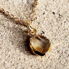 One of a kind, personalised natural rough birthstone gemstone necklace  H O W ∙ T O ∙ O R D E R 1st DROP DOWN menu * Select the chain length 2nd DROP DOWN menu * Select the pendant B I R T H S T O N E S [1cm x 0.8cm] November ... { Citrine } * All stones are in natural rough gemstones with gold plating * Complimentary personalized cards are also sent with your order for each birthstone M A T E R I A L S 14K GOLD plated G I F T S Each item is sent in a jewelry gift box, ready for gifting. We are Raw Stone Pendant Jewelry As Gift, Raw Stone Pendant Jewelry For Gifts, Citrine Birthstone Round Pendant, Citrine Birthstone Round Pendant Jewelry, Healing Gold Birthstone Necklace With Gemstone, Gold Birthstone Necklace For Healing, Citrine Birthstone Pendant Jewelry, Citrine Gemstone Jewelry For Gift, Teardrop Citrine Jewelry For Gifts