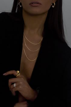 A sleek and versatile piece in the Hydez Essential Collection, the York 18K Gold vermeil snake chain necklace smooth and reflective design drapes on your neck like liquid gold. Slightly more slender than the Elliot necklace, York has the perfect balance of elegance and simplicity, to effortlessly transition from day to night. Material: 18K Gold VermeilWidth: 1 mmLength: Available in 16", 18" and 20" What is 18K Gold Vermeil?: 3 microns of 18K Gold over Sterling Silver. Vermeil is far more durabl Luxury Minimalist Jewelry For Fashion Statement, Minimalist Luxury Jewelry For Everyday, Luxury Jewelry With Elegant Design For Everyday, Luxury Elegant Jewelry 16 Inch Length, Luxury Timeless Everyday Jewelry, Luxury Classic Stackable Jewelry, Luxury Designer Elegant Jewelry, Luxury Elegant Designer Jewelry, Elegant Luxury Jewelry For Everyday