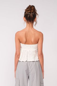 The Coastal Babe White Eyelet Strapless Top is the perfect summer top! Lightweight white eyelet fabric, shapes this crop top with a strapless neckline and a flowy flounce overlay. DETAILS & CARE Rayon/Lining: Polyester. Hand Wash Cold. Imported. Strapless Flowy Top, Overlay Top, Boho Pink, Eyelet Fabric, Strapless Neckline, Eyelet Top, Closet Door, Pink Boho, Flowy Top