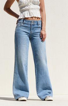 Step up your style this season with the Medium Indigo Double Button Low Rise Baggy Jeans from PacSun. Featuring a trendy low-rise waist and an ultra-slouchy full-length leg, these jeans offer a relaxed, baggy fit that exudes laid-back vibes. Complete with a classic 5-pocket body and a double button front zip fly closure, they're the perfect combination of comfort and style for any casual occasion. They're crafted from sustainably sourced rigid cotton for a durable and eco-conscious update.

Learn more about PacSun eco items Non-stretch Wide Leg Flare Jeans With Button Closure, Casual Flare Bottoms With Button Closure, Trendy Mid-rise Flare Jeans With Buttons, Summer Jeans With Button Closure, Casual Flare Bottoms With Buttons, Summer Full-length Jeans With Button Closure, Casual Medium Wash Flare Jeans With Button Closure, High Rise Flare Jeans With Button Closure, Blue Mid-rise Flare Jeans With Button Closure