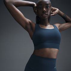 Find your bliss in this medium-support bra. A sewn-in 1-piece pad and longline silhouette offer enhanced coverage and shaping while sweat-wicking technology keeps you cool and comfortable. The fabric in the body and straps is lightweight, with softness that you can feel with every bend, stretch and shift. You might just forget you're wearing a bra at all. Sculpting Activewear With Built-in Padding For Workout, Nike Yoga Sports Bra With Built-in Bra, Nike Sports Bra With Built-in Bra For Yoga, Nike Sports Bra With Built-in Bra For Training, Nike Activewear With Built-in Bra For Workout, Sleeveless Sports Bra In Recycled Polyester, Nike Seamless Sports Bra For Training, Nike Sports Bra With Moisture-wicking Medium Support, Nike Medium Support Moisture-wicking Sports Bra