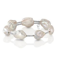 This chic bangle pearl bracelet features nine  9mm white baroque freshwater pearls. The pearls are mounted on the finest 18K gold bangle bracelet, with your choice of white gold or yellow gold. The bangle comes in a standard one size fits all. This item comes packaged in a beautiful jewelry gift box, perfect for gifting. Pearl White Bangle Bracelet With Pearl Charm, Pearl White Bangle With Pearl Charm, Pearl White Bangle Pearl Bracelet, Pearl White Pearl Bangle Bracelet, Elegant White Pearl Bangle, Elegant White Baroque Pearl Beaded Bracelets, Luxury White Baroque Pearl Bracelets, Elegant White Baroque Pearl Beaded Bracelet, White Akoya Pearl Bracelet With Pearl Charm