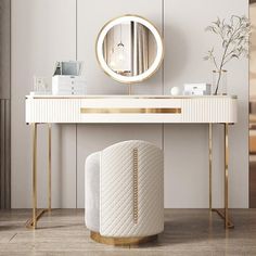 a white dressing table with a round mirror on it and a stool in front of it