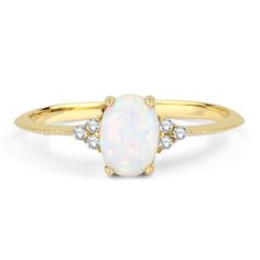 Dainty Opal Ring, Natural White Opal Ring, Stacking Ring, Diamond Ring, 14k Solid Gold Ring, October Birthstone Ring, Oval Cut Opal, Stacking Ring, Solitaire Opal Ring, Promise Ring, Engagement Ring, 14K Solid Gold Natural Oval cut opal stone with both sides 3 real diamonds ring. ITEM DETAILS * Made to Order. * Material: 14K Solid Gold * Material Color Options: Yellow Gold, Rose Gold, White Gold * Band Width: 1.20 MM * Gemstone: Opal * Gemstone Carat: 0.50 CTW * Gemstone Cut: Oval Cut * Side Sto Classic Oval Opal Jewelry, Heirloom Oval Opal Ring For Anniversary, Dainty Oval White Diamond Ring, Dainty White Oval Diamond Ring, Oval 14k Gold Opal Ring, Dainty Oval Opal Ring For Anniversary, 14k Gold Oval Cabochon Opal Ring For Anniversary, Oval White Moonstone Ring In 14k Gold, Yellow Gold Oval Opal Ring